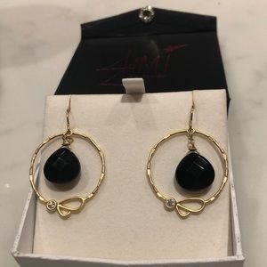 Gold dangling pierced earrings